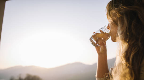 Young woman relaxes on terrace