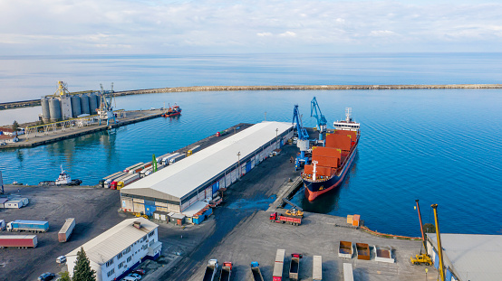 Cargo ship unloading of coal in a commercial port.  Hopa, Artvin.