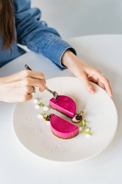 istock Female ready to eat yummy cheesecake 1215540831
