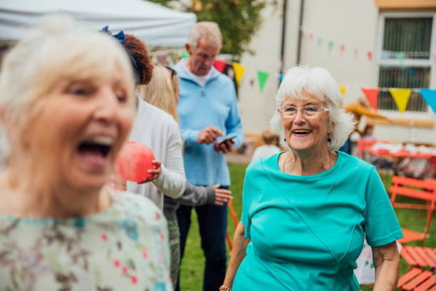 istock Seniors In The Garden 1215543026