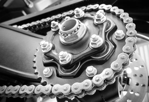 motorcycle sprocket and chain - bicycle gear fotos imagens e fotografias de stock