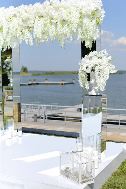 istock White wedding altar with lake in backround 1215543918