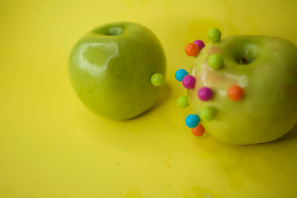 Covid 19 analogy, using apples, of social distancing with bright background