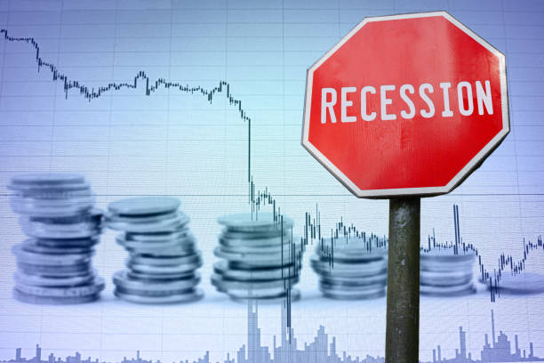 istock Recession sign on economy background - graph and coins 1215545138