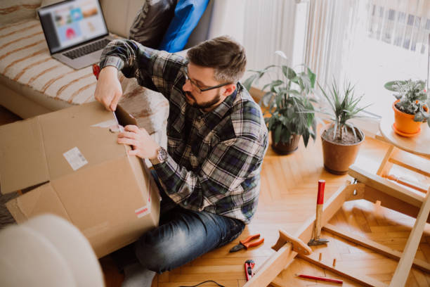 istock Man moving into a new house 1215545935