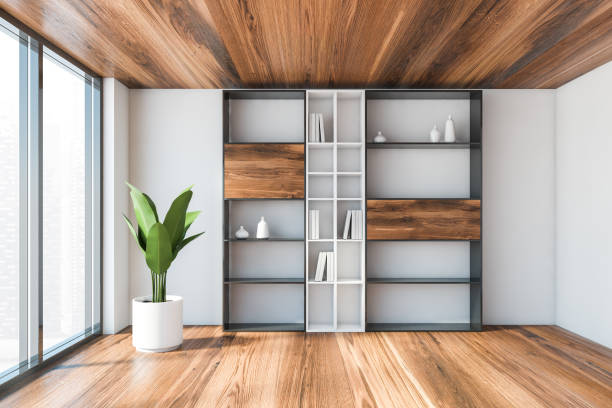 istock White living room interior with bookcase 1215546819