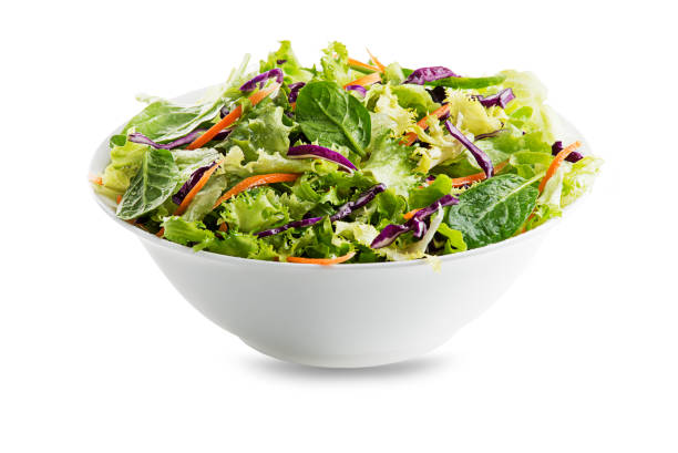 istock Green lettuce salad with fresh mixed vegetables 1215549141