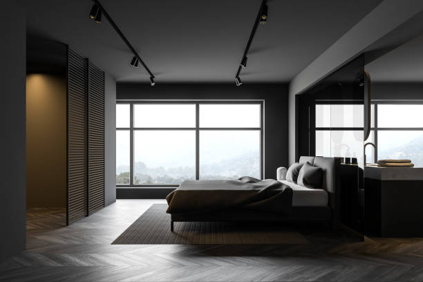 istock Gray master bedroom and bathroom, side view 1215551471