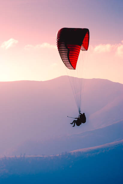 istock Paraglide silhouette in a carpathian evening sky 1215552865
