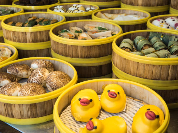 istock funny mantou - Chinese steamed stuffed buns 1215552915