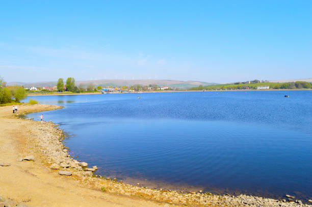 Hollingworth Lake, Littleborough, Rochdale, Greater Manchester; England; UK, Europe  - April 21, 2019 : Visitors at Hollingworth Lake in Rochdale in the spring sunshine