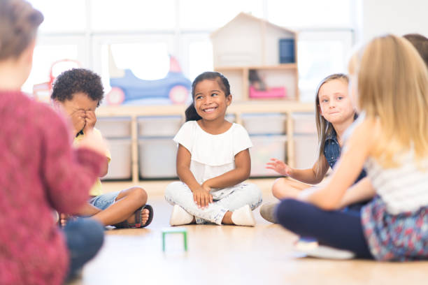 istock Kindergarten Class During Circle Time stock photo 1215556574