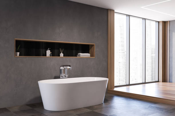 istock Gray bathroom corner with tub and shelf 1215556594