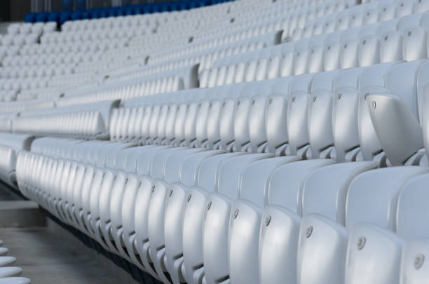 istock Empty white seats at the stadium during isolation period 1215562691