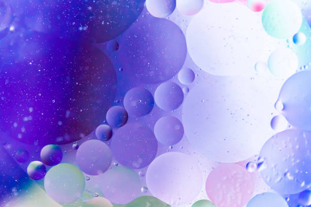 istock abstract background with oil drops. Colourful backdrop with water and round bubbles with space for your text. 1215565590