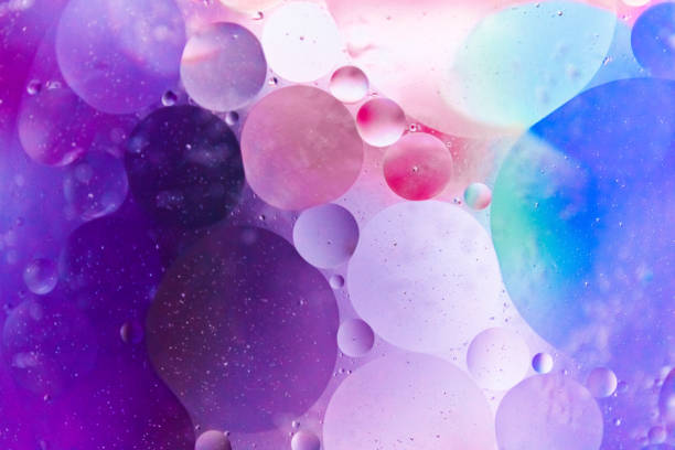 istock abstract background with oil drops. Colourful backdrop with water and round bubbles with space for your text. 1215565669