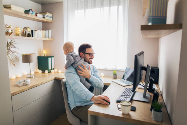 istock Young father working from home and babysitting. 1215566787