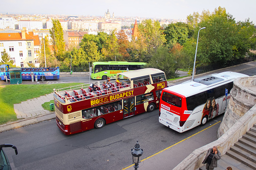 Budapest, Hungary - October 06, 2014: few tourist buses near the stairs in front of Fisherman's Bastion