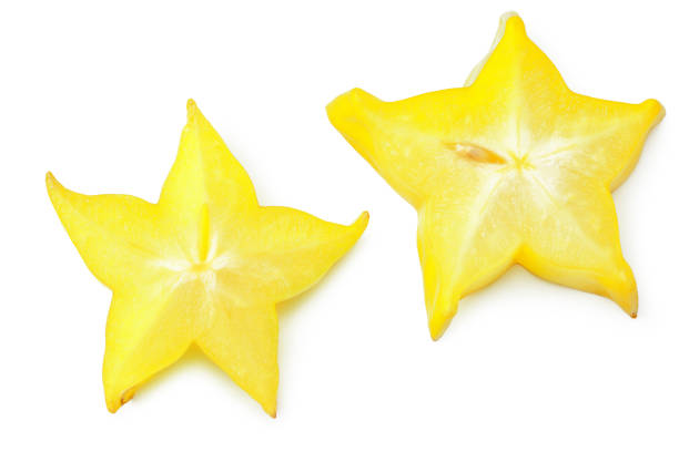 istock slice ripe star fruit carambola or star apple ( starfruit ) on white background. top view 1215572265
