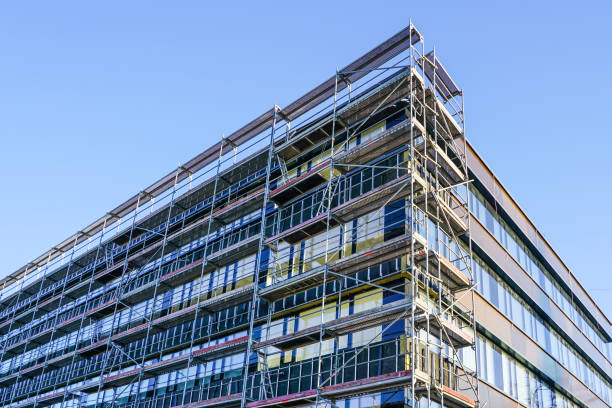 istock house facade renovation and thermal insulation, scaffolding 1215573004