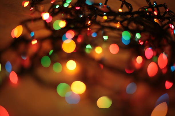 istock Macro Burning and sparkling sparkler Christmas festive bokeh background 1215574253