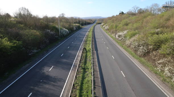 istock Deserted duel carriageway during the covid 19 lockdown. 1215574579