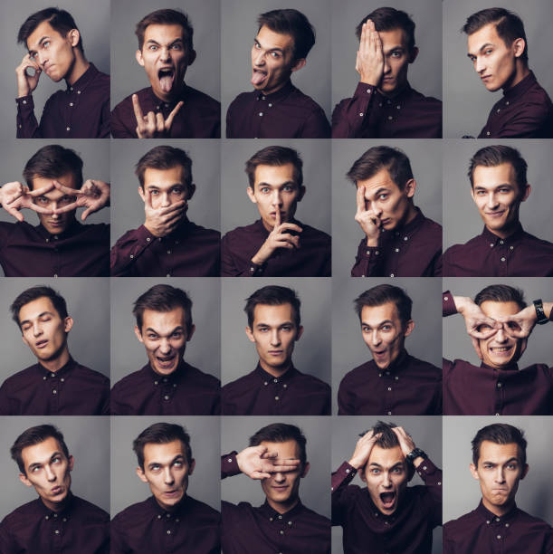 istock Set of young man's portraits with different emotions and gestures 1215583645