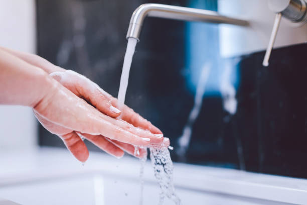 istock Washing hands with foam soap. Hygiene, preventing coronavirus 1215584104