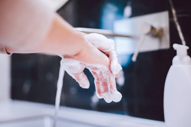 istock Washing hands with foam soap. Hygiene, preventing coronavirus 1215584117