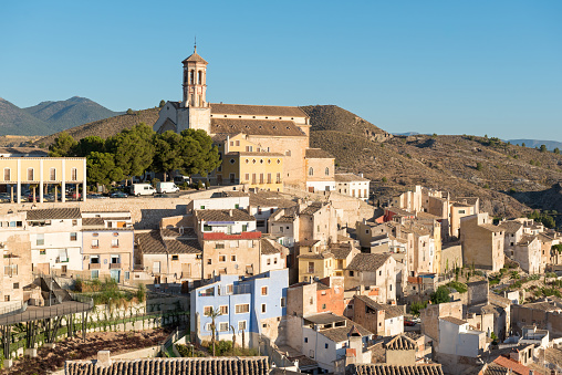 Early morning sunlight on the hillside town of Cehegin in the Murcia region of Spain Europe