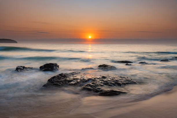 istock Pretty Pastel Summer Sunrise by the Sea 1215584817