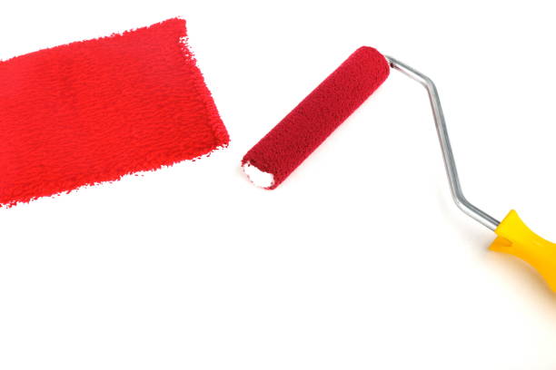 istock red paint and painting roller 1215587563