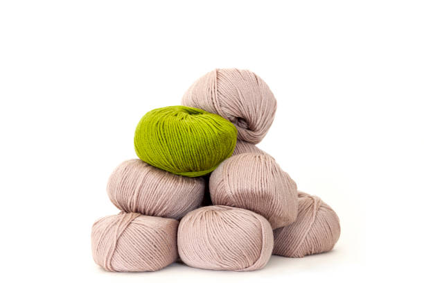 istock Balls of wool, white bcakground with copy space 1215588777