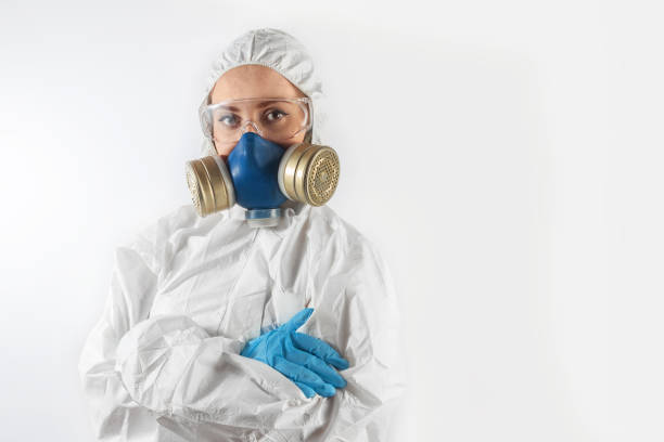 istock woman in respirator 1215596244