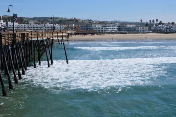 Pismo Beach is a California beach town on the Central Coast known for its for its long, sandy beaches, pier, and driving on the sand dunes.
