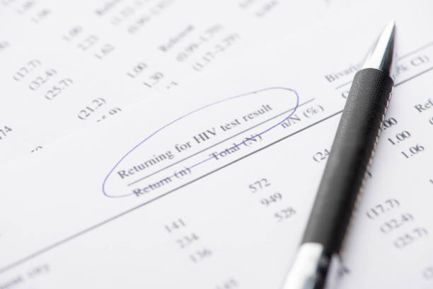istock close up view of returning for HIV test result form with pen 1215598903