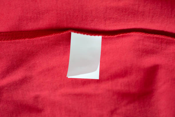 istock White laundry care washing instructions clothes label on red cotton shirt 1215601603