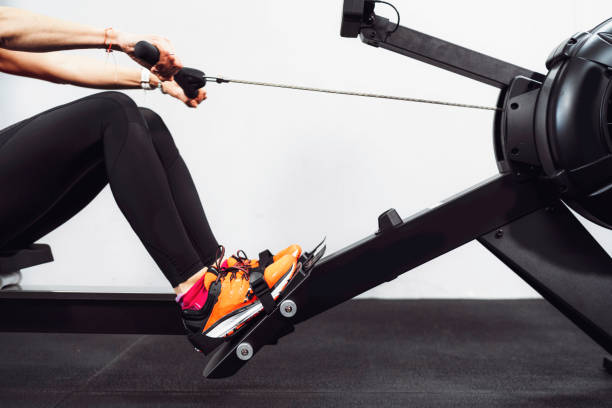 istock Unrecognizable woman on rowing machine 1215602223