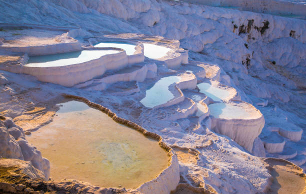istock Pamukkale pool terraces in Hierapolis in Turkey 1215605855