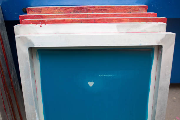 istock Silk screen printing. Serigraphy. Color paints and fabric. 1215606038