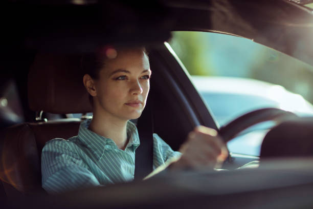 istock Businesswoman Driving 1215611425