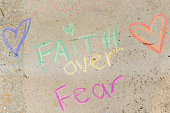 istock "Faith Over Fear" Covid-19 Inspirational Sidewalk Chalk Art 1215613883