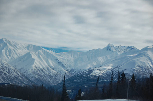 The mountains rise above the Matanuska Valley. This mountain is a welcome site for those who travel the many miles of Interior Alaska.
