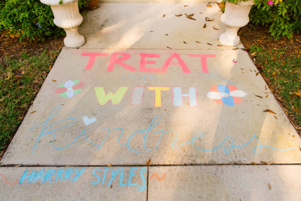istock Covid-19 Inspirational Sidewalk Chalk Art 1215615951