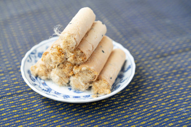 Thai Dessert, Thai crispy coconut roll with dried shredded pork inside