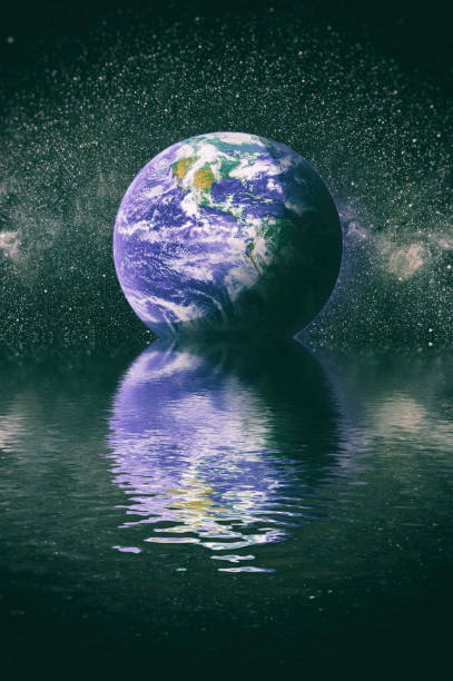 istock Our planet is earth in space, reflected in water. Beautiful unusual space . This image elements furnished by NASA 1215625038