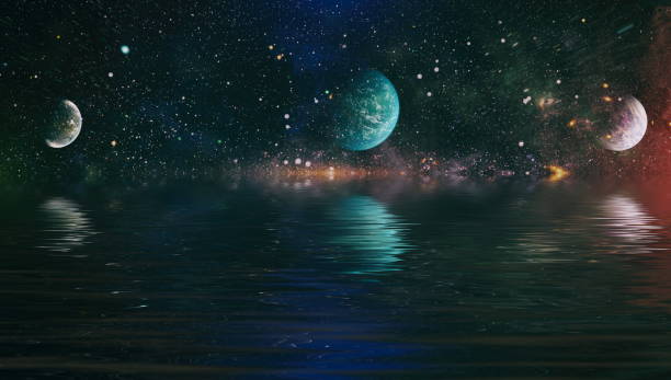 istock planet in space reflected in water. Beautiful unusual space , Planet and Galaxy - Elements of this Image Furnished by NASA , 1215625084