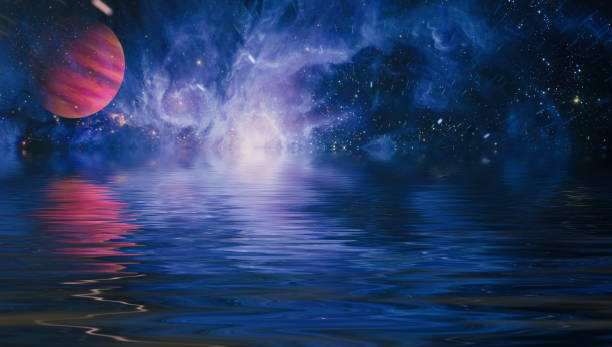 istock planet in space reflected in water. Beautiful unusual space , Planet and Galaxy - Elements of this Image Furnished by NASA , 1215625143