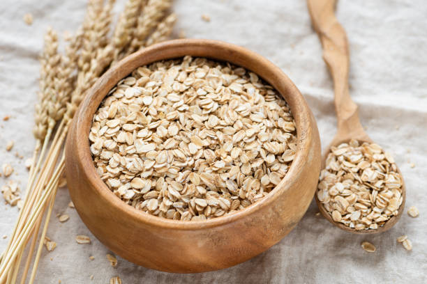 istock Rolled oats in wooden bowl 1215625166