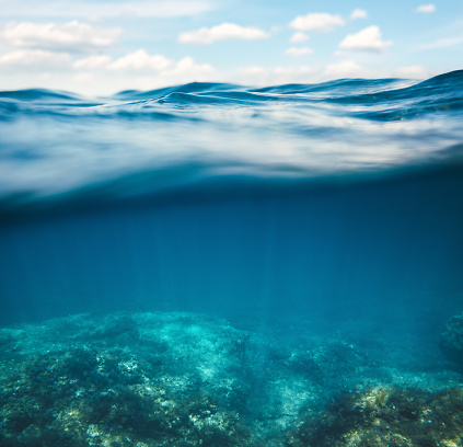 Underwater view on sea waves (combined underwater and surface view).